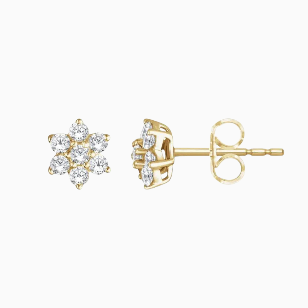 Crafted with 14k gold and natural diamonds, these flower-shaped studs offer 3/8 CTW of sparkling diamonds to enjoy. Sold as a pair.