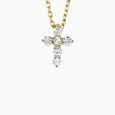 This adjustable 16-18" 14k Gold & Natural Diamonds Cross Necklace features 1/6 ct of Natural Diamonds in an 8.7 x 6.3mm size. It is available in yellow, white, and rose gold.