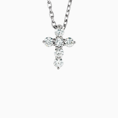 This adjustable 16-18" 14k Gold & Natural Diamonds Cross Necklace features 1/6 ct of Natural Diamonds in an 8.7 x 6.3mm size. It is available in yellow, white, and rose gold.