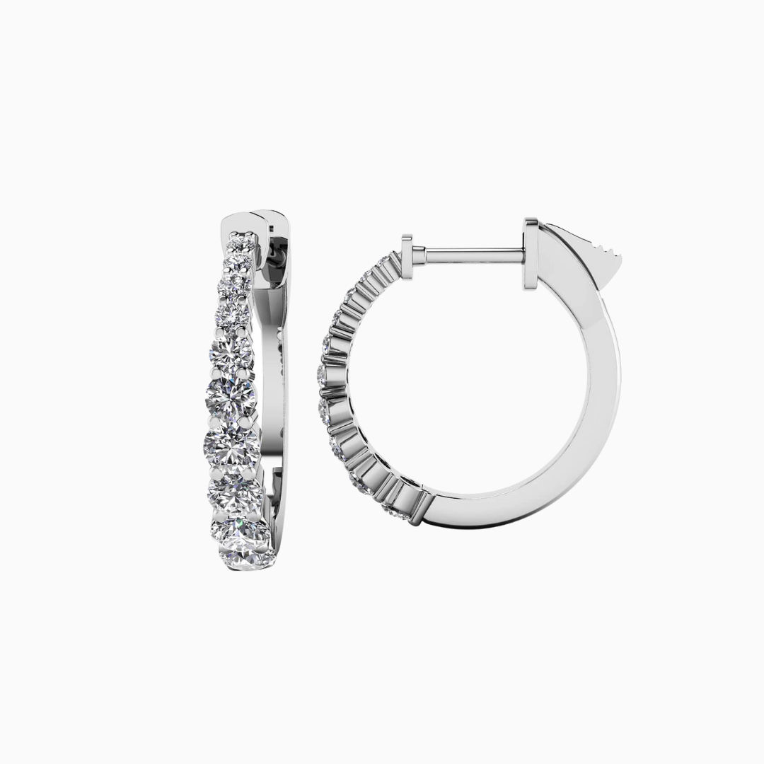 These beautiful diamond hoop earrings feature a sparkling row of round diamonds that taper towards the top. Measuring .60 in height (16mm). 