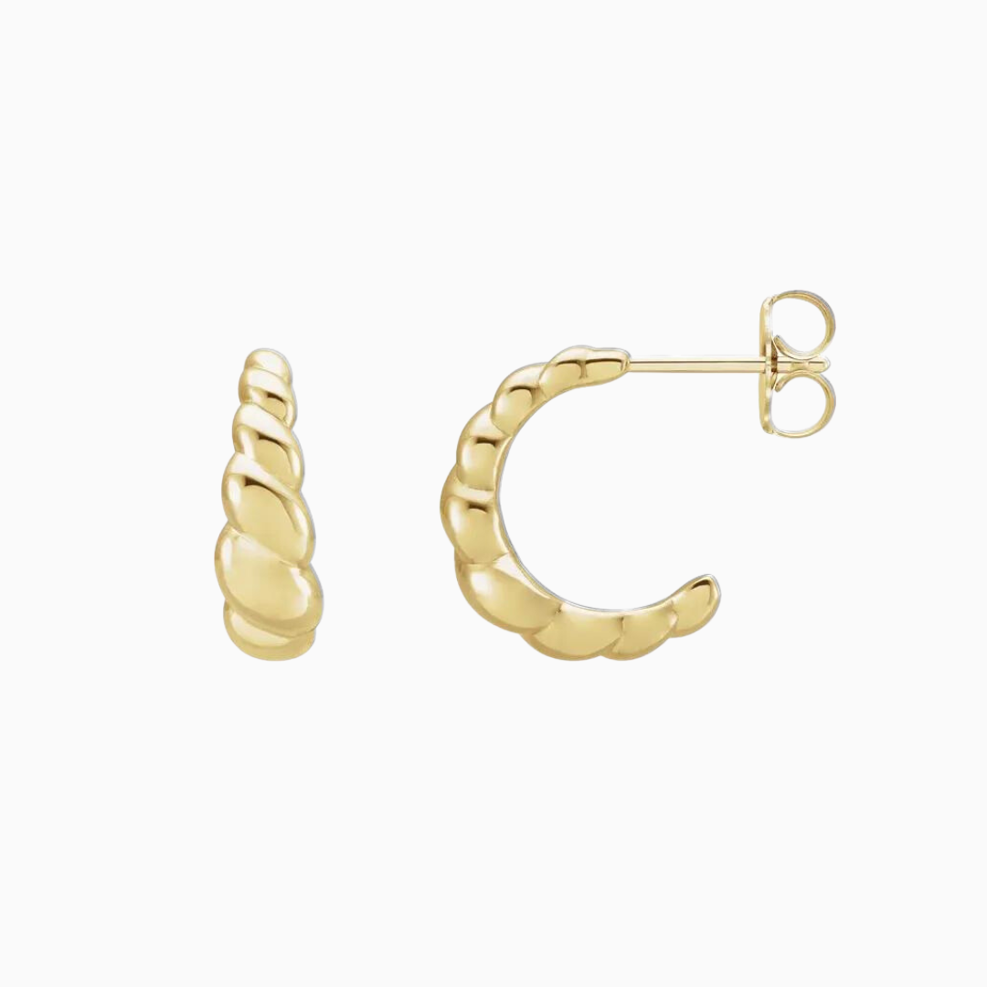 Crafted from 14K gold, these pair of earrings feature a croissant-shaped design.