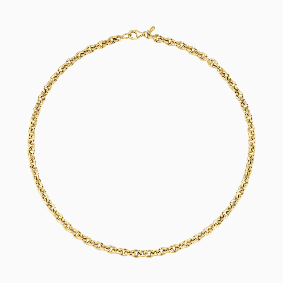 The Sienna Chain Necklace is our bold take on an oval link chain. Featuring circular interlocking links made from hollow 14k gold, this necklace elevates your look without weighing you down.