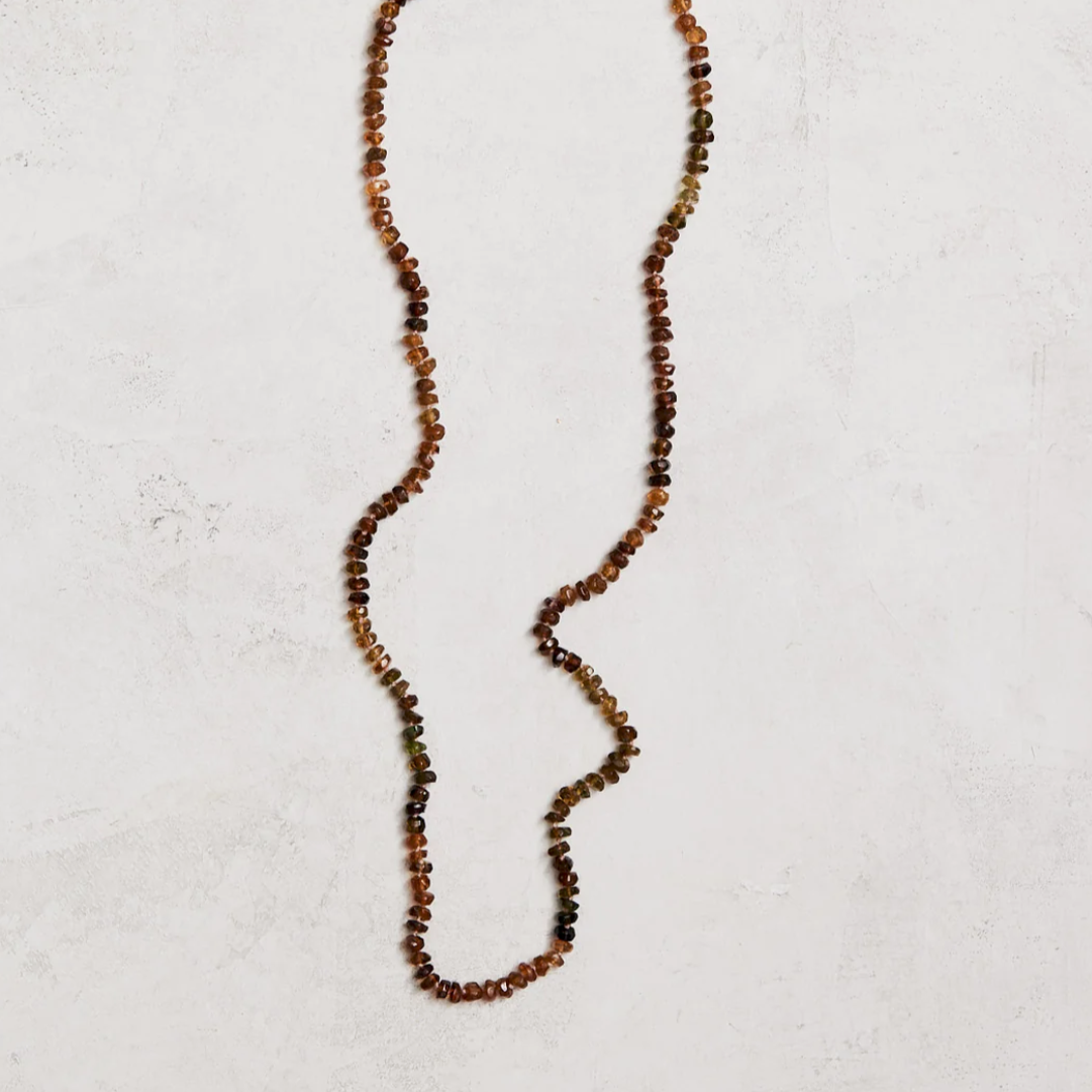 19" natural green & copper tourmaline hand-knotted on silk with gold-filled findings & lobster clasp.