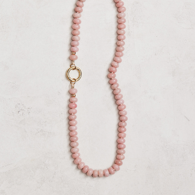 Natural pink opals hand-knotted on ivory silk with gold-filled findings and a round connector. Handmade by Nicole Gerulat.