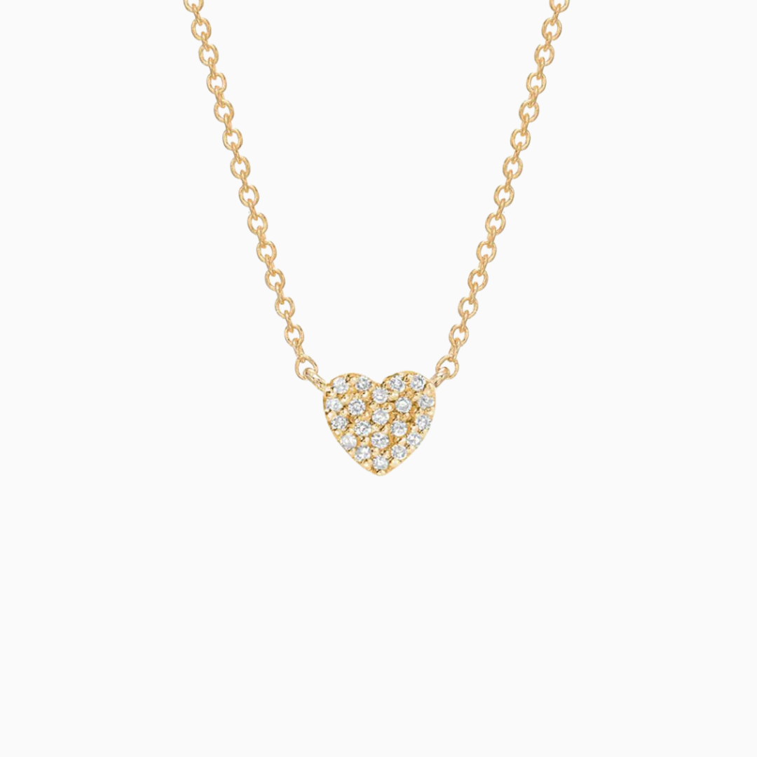 This mini sweetheart necklace is an all-time classic. Here are a few of the top features:  Available in rose gold, yellow gold, and white gold 16-18" adjustable chain length Approximate dimensions of heart: 4.7mm x 5.5mm Total approximate diamond weight: 0.05ct