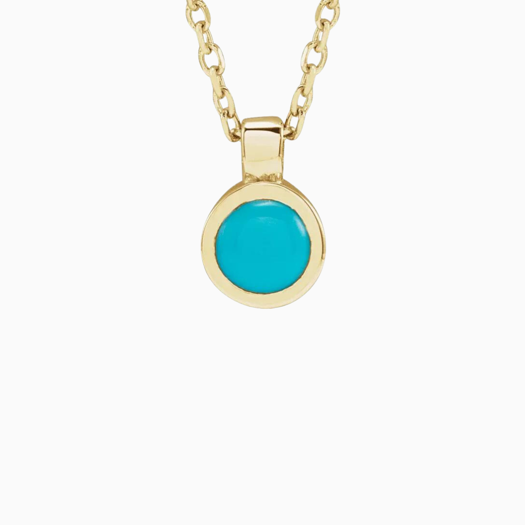 16-18" adjustable 14k gold chain with a bezel-set natural turquoise pendant.