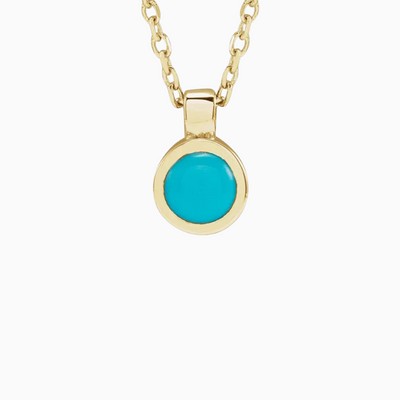 16-18" adjustable 14k gold chain with a bezel-set natural turquoise pendant.