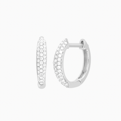 The Diamond Dome Huggie Earring is a unique spin on a traditional huggie, thanks to its dome-like silhouette. Featuring .20 carats of pavé diamonds for the pair, this huggie is sure to become an everyday staple.