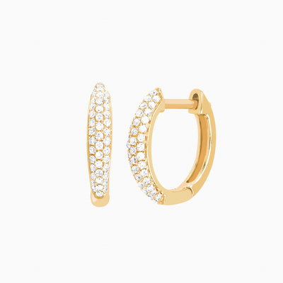 The Diamond Dome Huggie Earring is a unique spin on a traditional huggie, thanks to its dome-like silhouette. Featuring .20 carats of pavé diamonds for the pair, this huggie is sure to become an everyday staple.