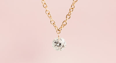 Floating Diamond Necklace 16" length 14K yellow gold chain 1/6 ct drilled natural diamond solitaire