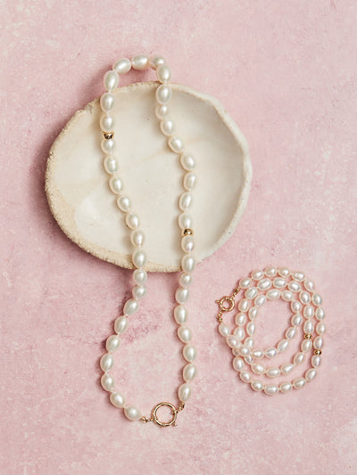 (Left) Large: 17" large freshwater pearl necklace with 14kt gold beads and sailor clasp.