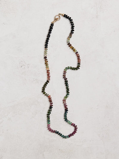 18.5" natural 4mm tourmaline hand knotted on silk and finished with a gold-filled toggle clasp. Handmade by Nicole Gerulat.