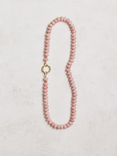 Natural pink opals hand-knotted on ivory silk with gold-filled findings and a round connector. Handmade by Nicole Gerulat.