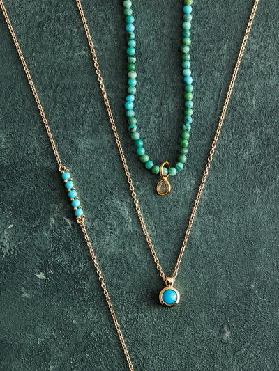 This sophisticated necklace boasts a 16.5" strand of natural turquoise and rose cut diamonds, bezel-set in 14K gold. A secure gold-filled magnetic clasp completes the look, and it has been handmade by with care by Nicole Gerulat.