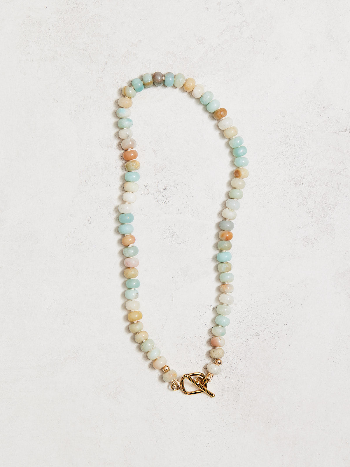 16" natural amazonite necklace with gold-filled beads and square toggle clasp. Leave a note if you'd like a different clasp. Handmade by Nicole Gerulat.