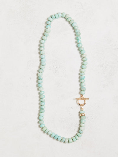 18" natural greenish blue aquamarine necklace, hand-knotted on hand-dyed silk, with gold-filled findings and elongated clasp. Handmade by Nicole Gerulat.