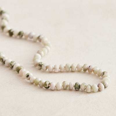 16" 6mm natural lavendar jade, hand-knotted on ivory silk with gold-filled findings and sailor clasp. Handmade by Nicole Gerulat.