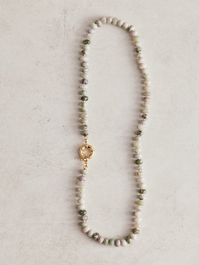 16" 6mm natural lavendar jade, hand-knotted on ivory silk with gold-filled findings and sailor clasp. Handmade by Nicole Gerulat.