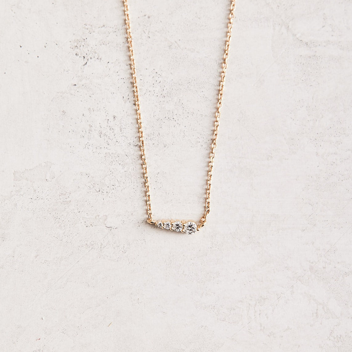 16" 14K Yellow Triple Graduated Diamond Necklace with 1/10 CTW Natural Diamonds.