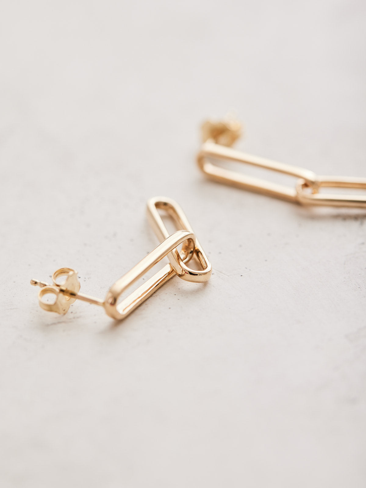 14k gold paperclip drop earrings, available in yellow, rose & white gold.