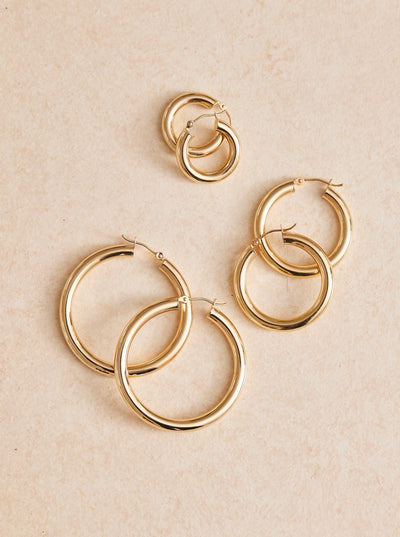 Big Hoop Energy Tube Earrings. Super lightweight and 14k gold, sold in 3 sizes.