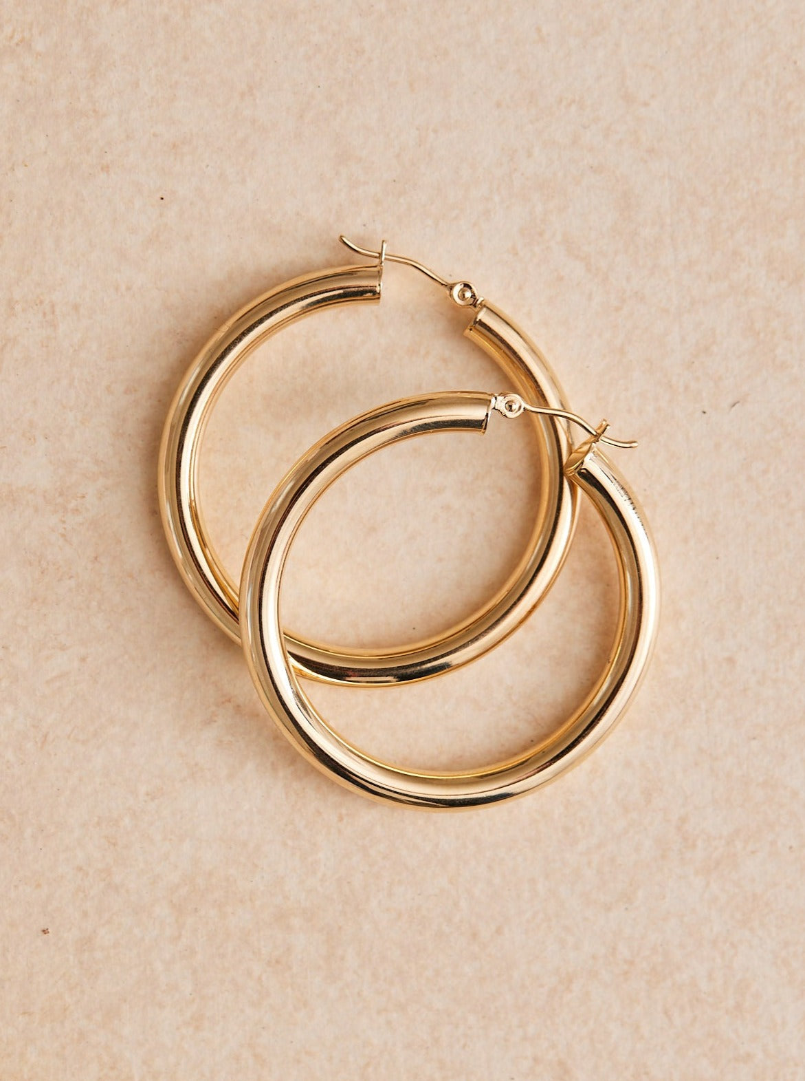 Big Hoop Energy Tube Earrings. Super lightweight and 14k gold, sold in 3 sizes.