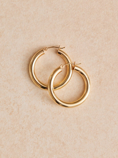 Big Hoop Energy Tube Earrings. Super lightweight and 14k gold, sold in 3 sizes.