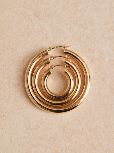 Big Hoop Energy Tube Earrings. Super lightweight and 14k gold, sold in 3 sizes.