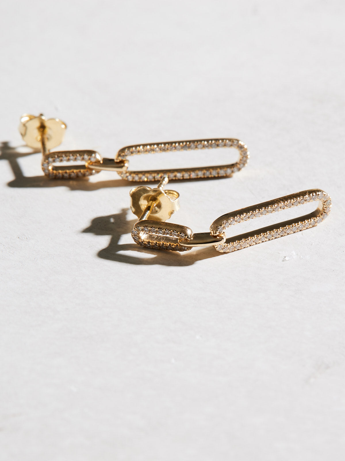 Sparkling 14k gold & natural diamond link earrings, available in yellow, white and rose gold. 32.5mm x 6mm.