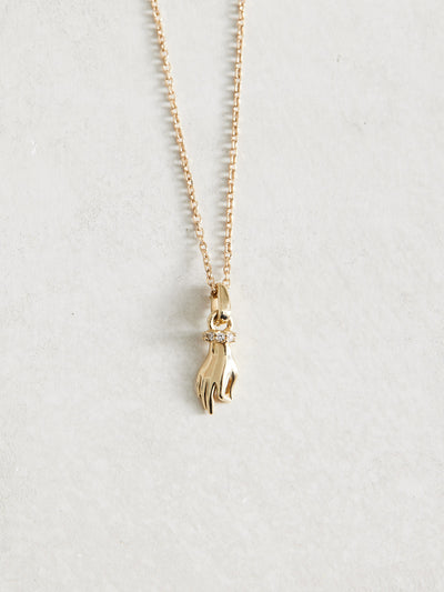 14k Gold & Natural Diamonds Hand of Buddha Necklace, .05 CTW Natural Diamonds,12.81x4.64 mm, 16-18", available in yellow, white and rose gold.  All proceeds for this necklace will be donated to a Bhuddist charity. Details to come. 