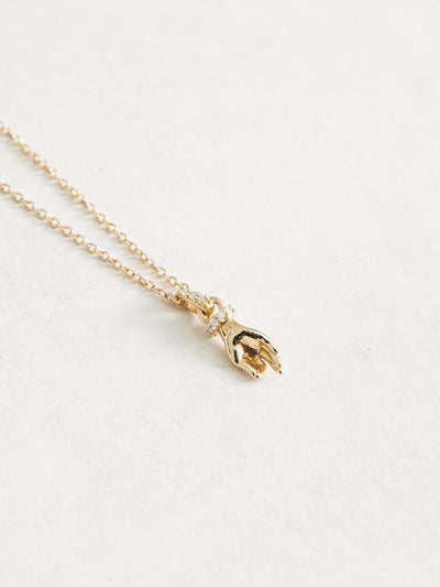 14k Gold & Natural Diamonds Hand of Buddha Necklace, .05 CTW Natural Diamonds,12.81x4.64 mm, 16-18", available in yellow, white and rose gold.  All proceeds for this necklace will be donated to a Bhuddist charity. Details to come. 